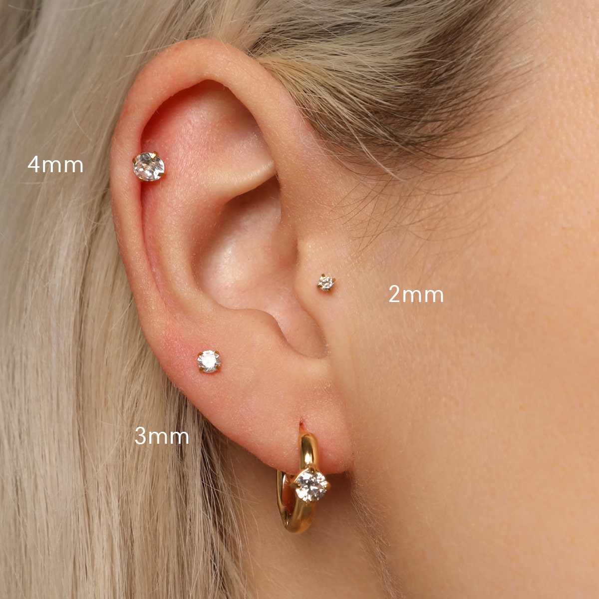 britney-piercing-stein-helix-tragus-conch-min.jpg